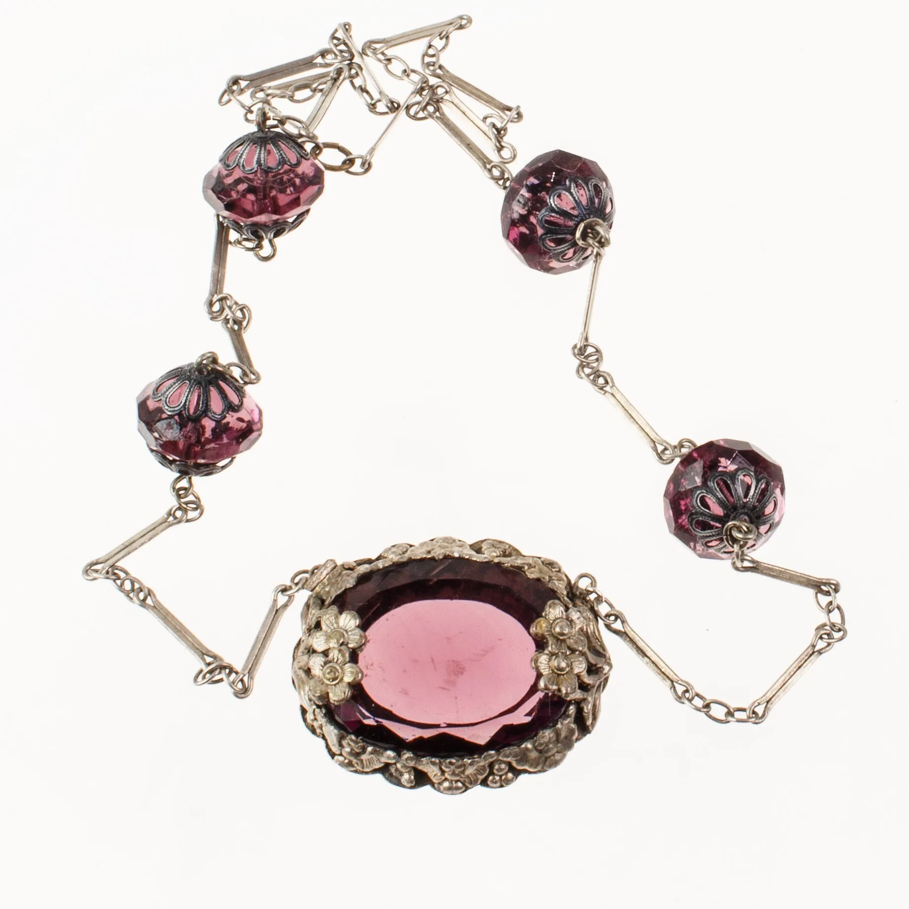 Art Deco pendant necklace, amethyst glass with floral bezel j-NLAD991